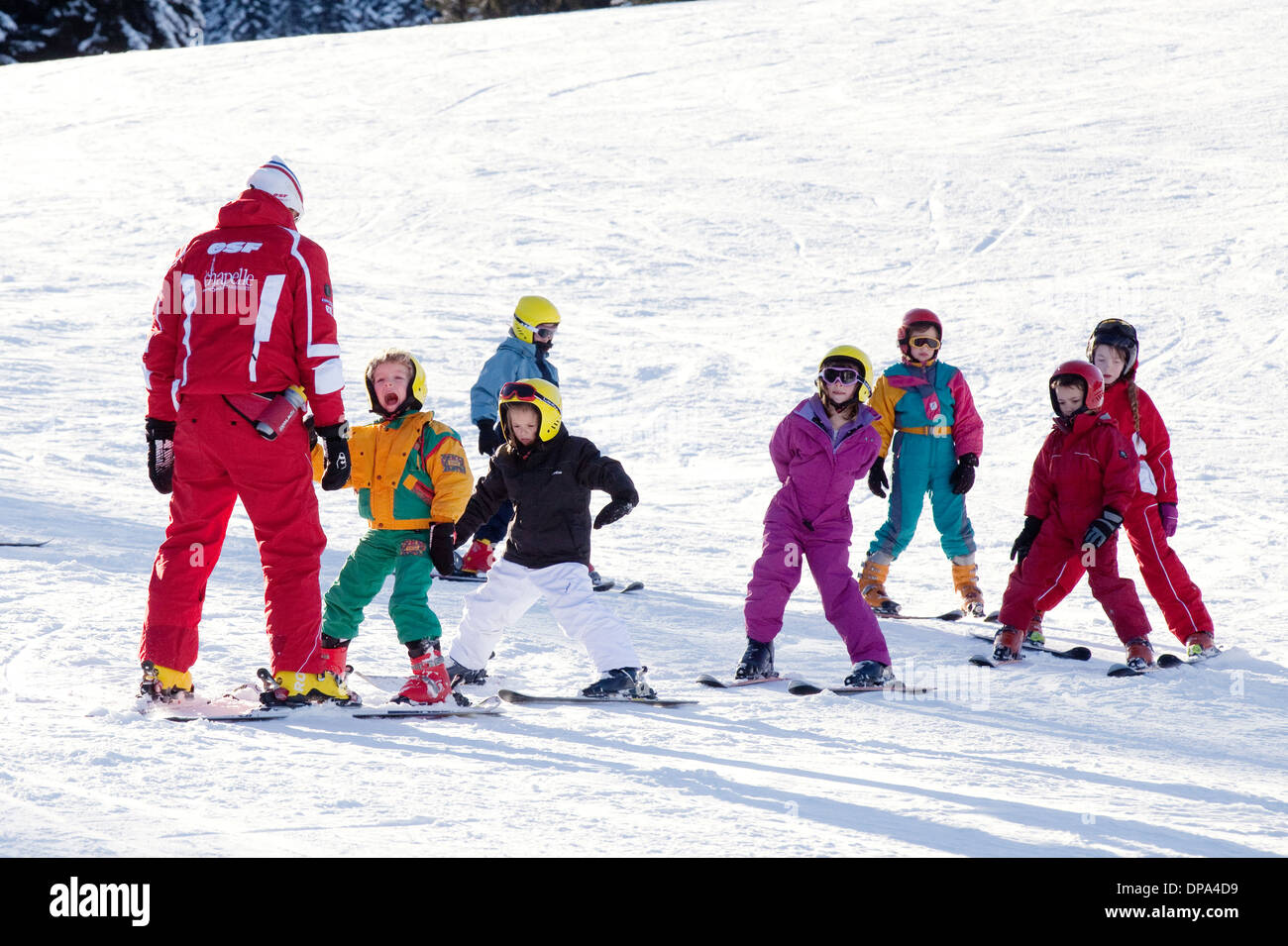Children skiing, learning to ski in ski school, La Chapelle D'Abondance, French Alps, France Europe Stock Photo