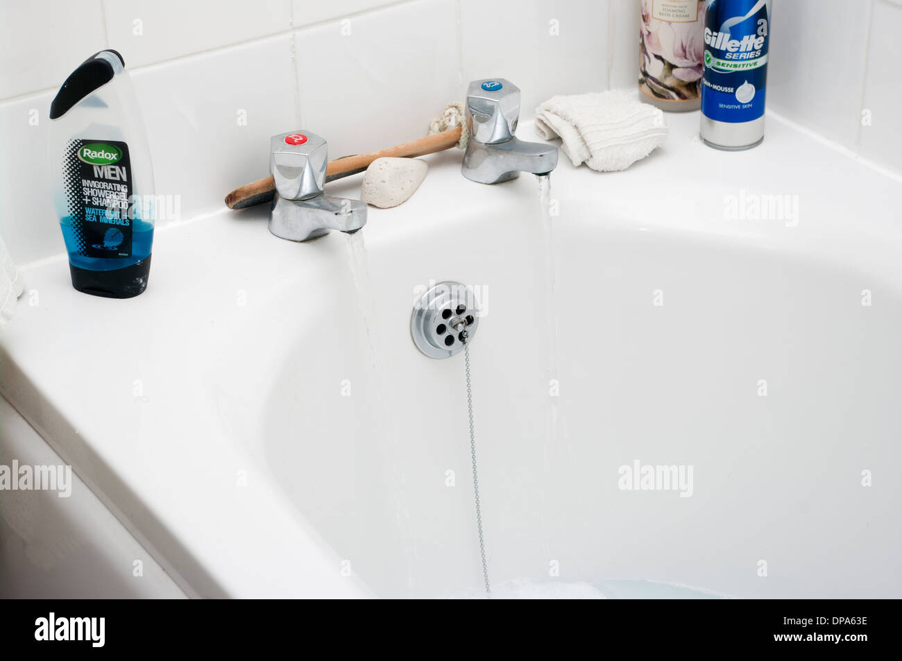 Filling a bath with bathwater from Running Hot and Cold Taps Stock Photo