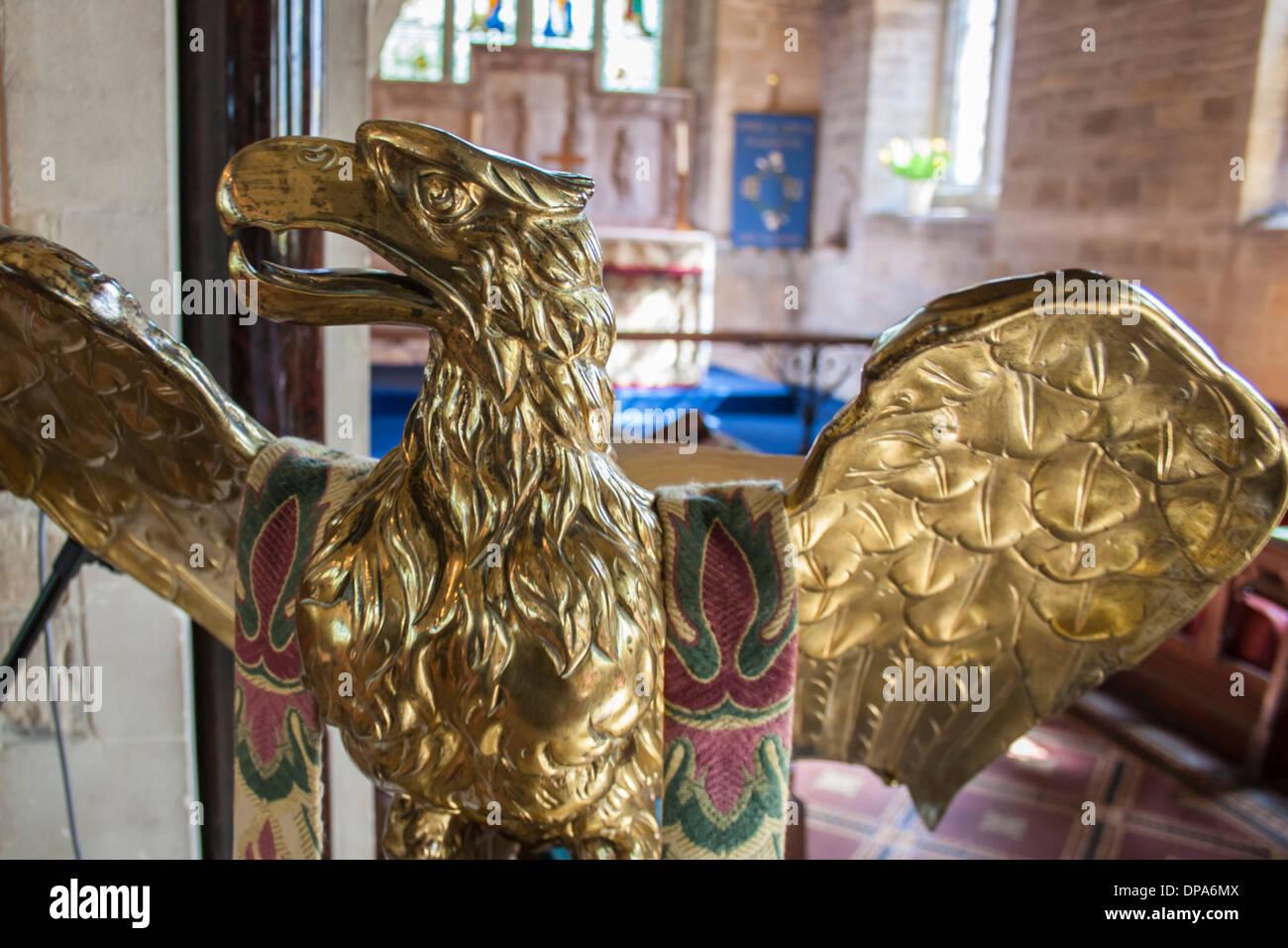 Church brass eagle lecturn in the Cotswolds: St Mary's Church, Lower Slaughter, Gloucestershire. UK. Stock Photo