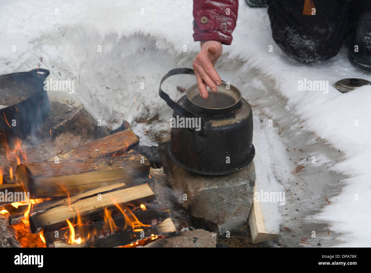 Outdoorlife Cooking on Campfire Coffee-cettle and Jokkmokk Historic Fair Laponia Sweden Stock Photo