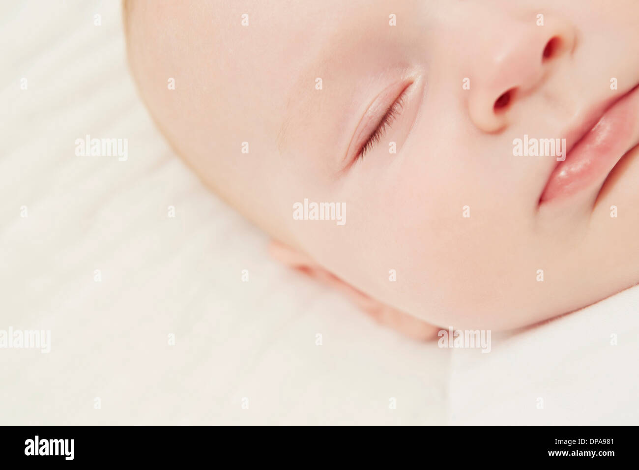 Baby girl sleeping in crib hi-res stock photography and images - Alamy