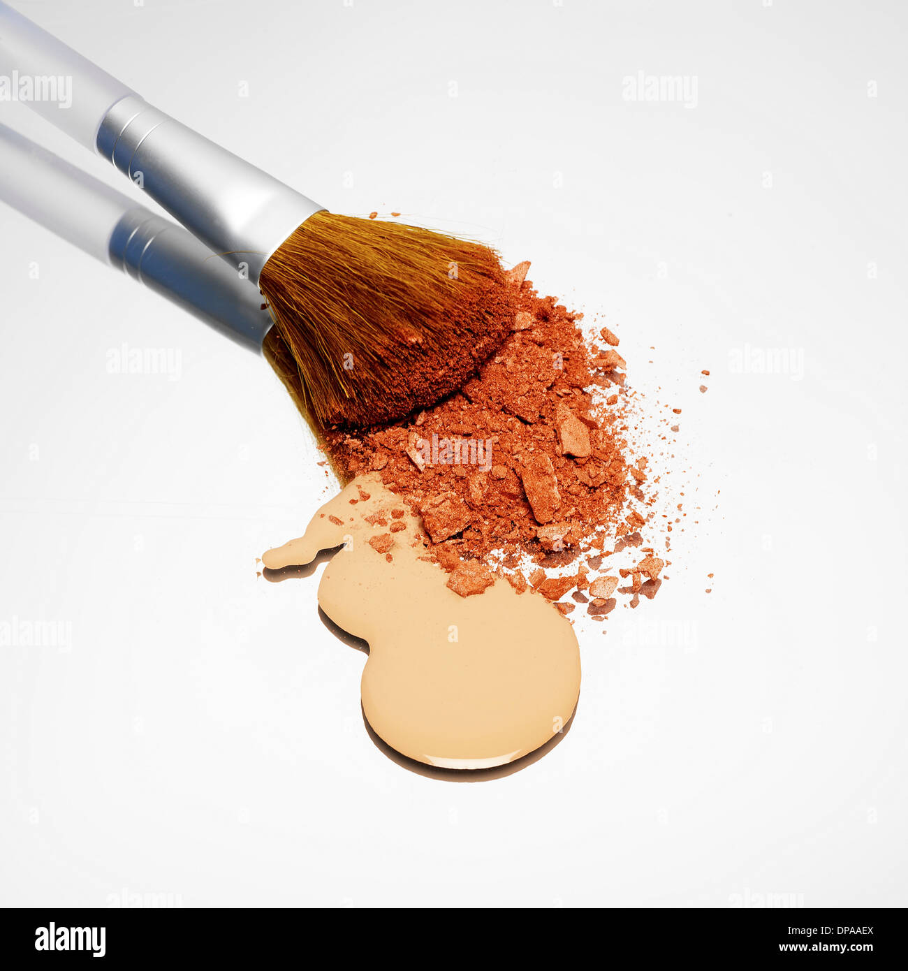 Foundation and blusher with make up brush Stock Photo