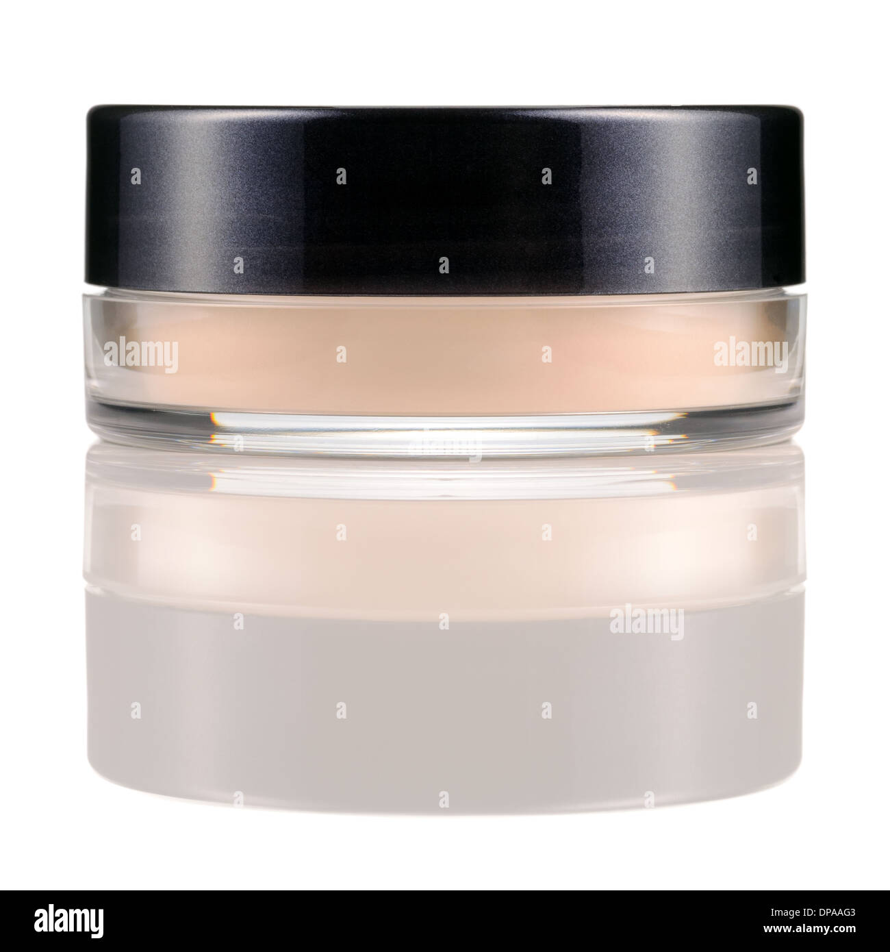 Translucent loose powder in a jar isolated on white background. Makeup