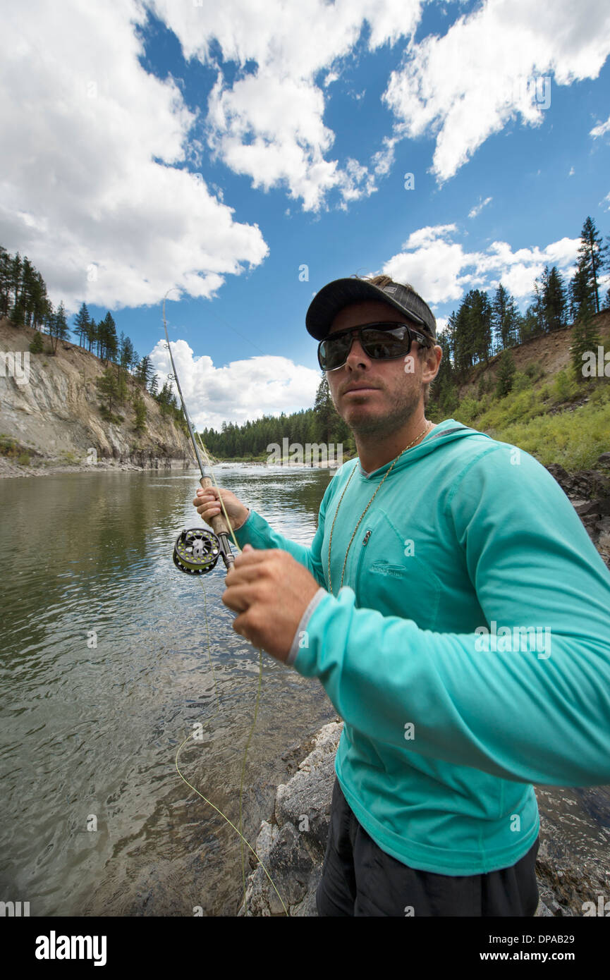 Man fly fishing in the Clark Fork River in Montana Stock Photo Alamy