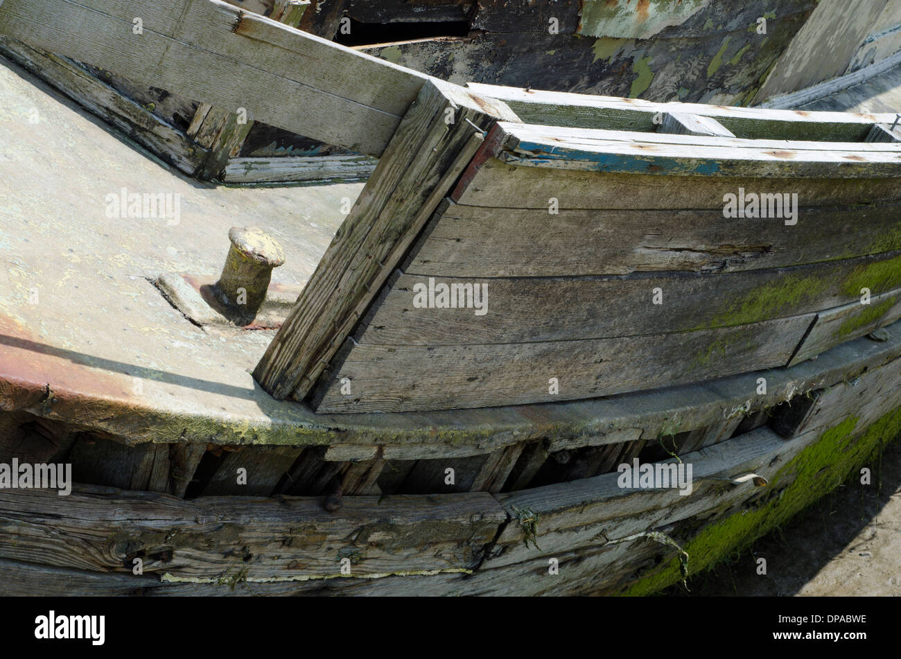 An old boat wreck in the sand in Newquay Stock Photo