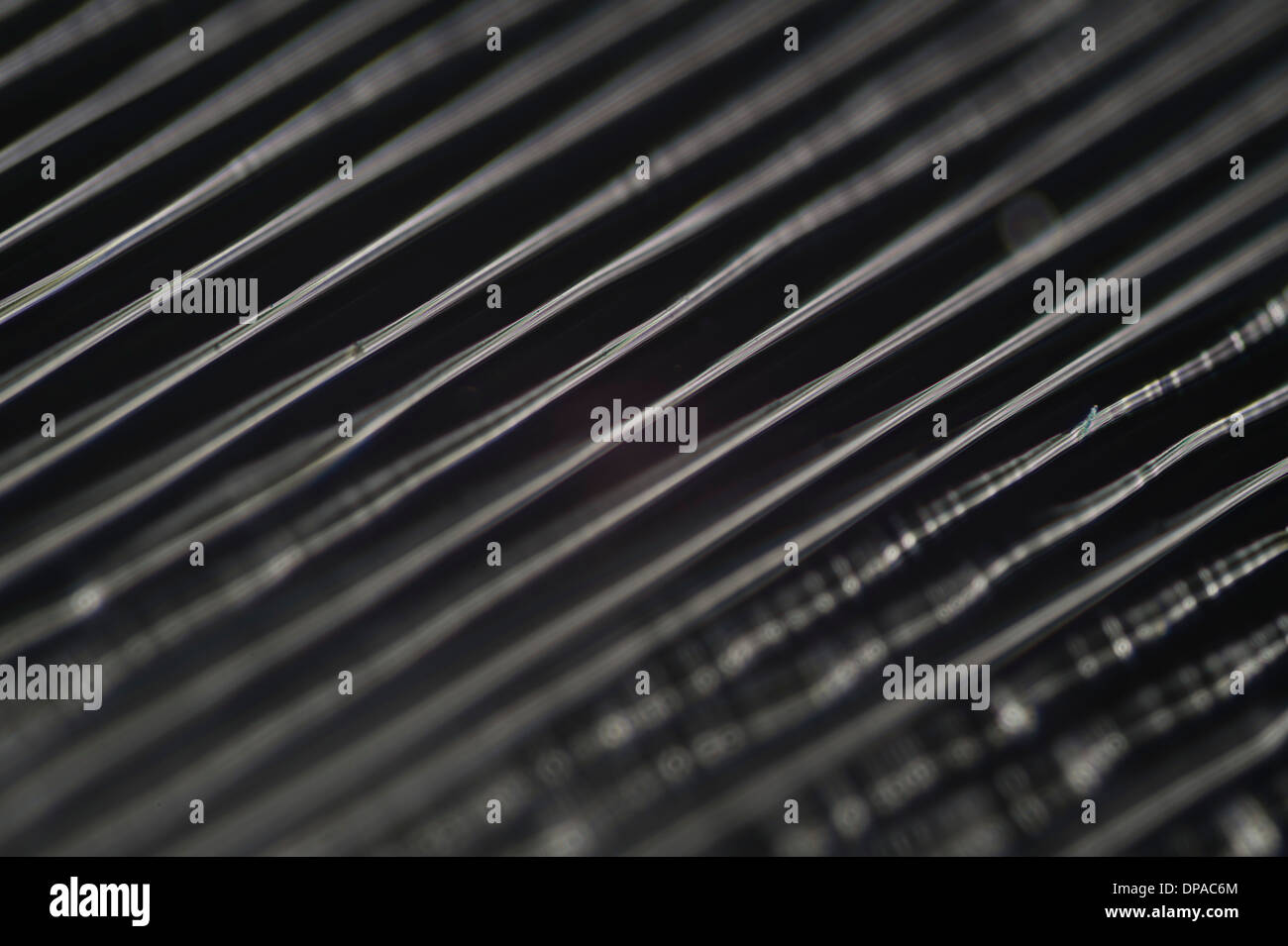 Smooth sound closeup image of actual grooves in a 33.3rpm vinyl