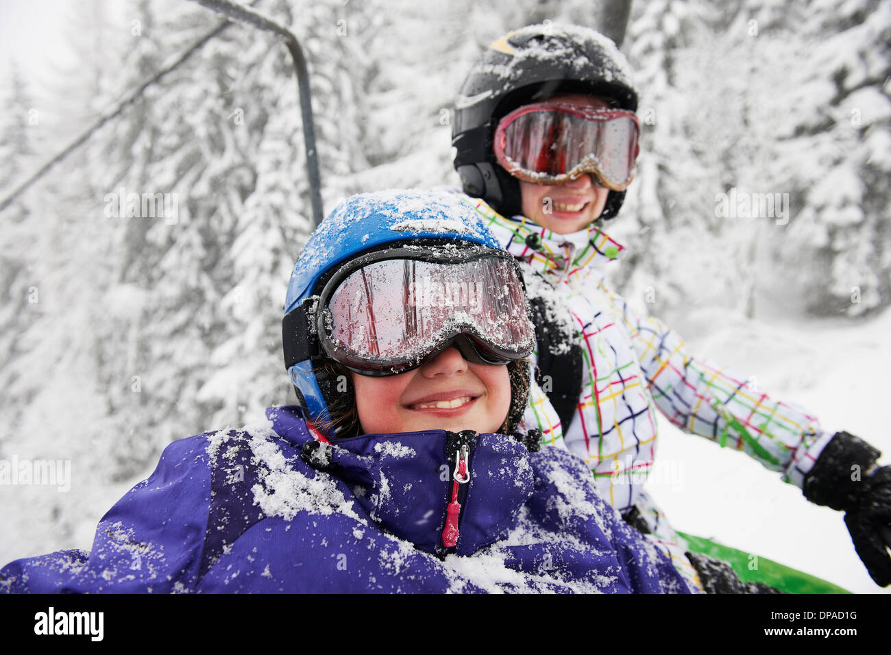 Portrait of snow covered sisters, Villaroger, Hauste Savoie, France Stock Photo