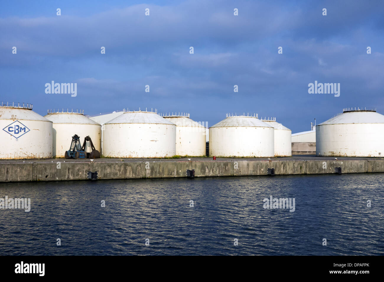 Bulk storage silos of the Compagnie Belge de Manutention / CBM / Sea-Invest at the port of Ghent, East Flanders, Belgium Stock Photo