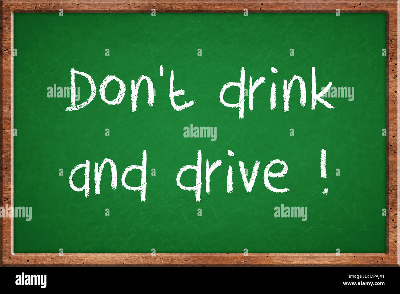 A dirty blackboard in the classroom with don't drink and drive words Stock Photo