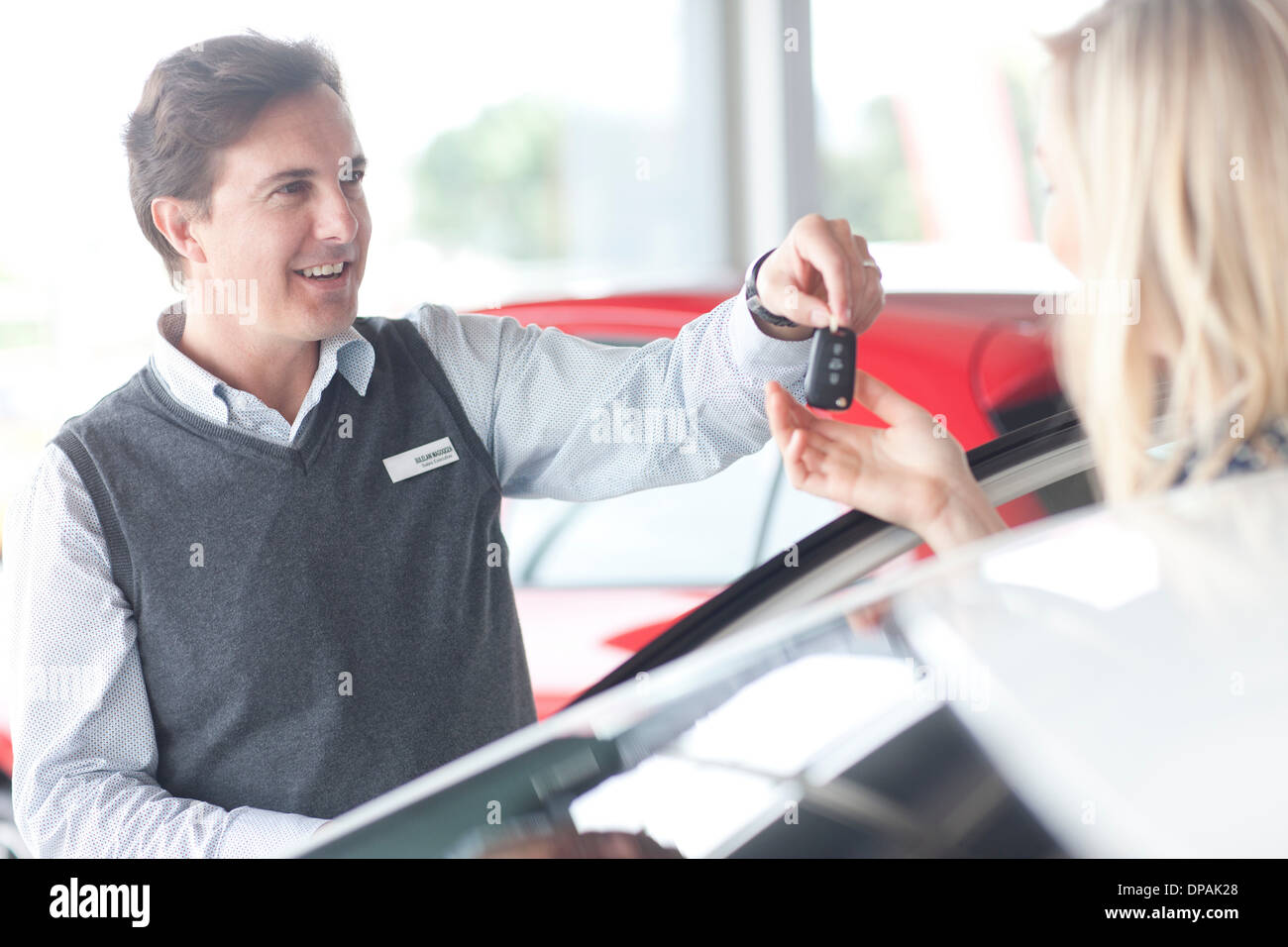 Handing car keys hi-res stock photography and images - Alamy