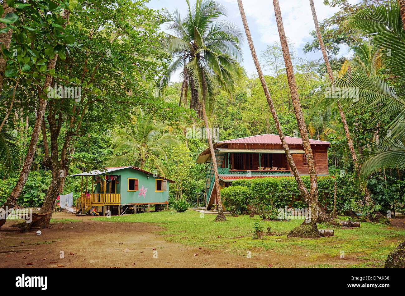 Caribbean house and hut with tropical vegetation, Gandoca Manzanillo national wildlife refuge, Limon, Costa Rica Stock Photo