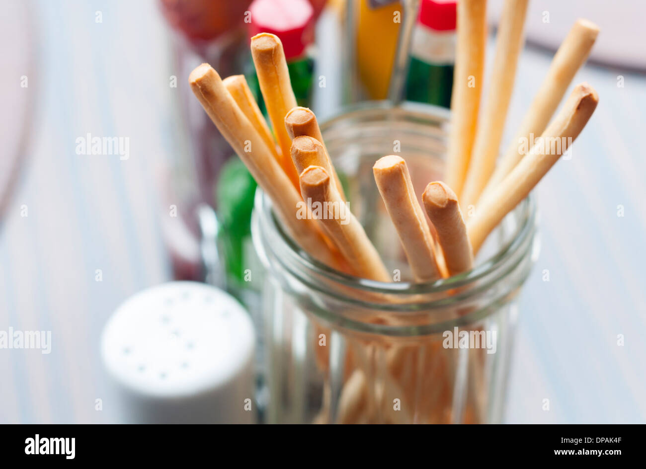 fresh and crunchy breadsticks on the table in restaurant Stock Photo