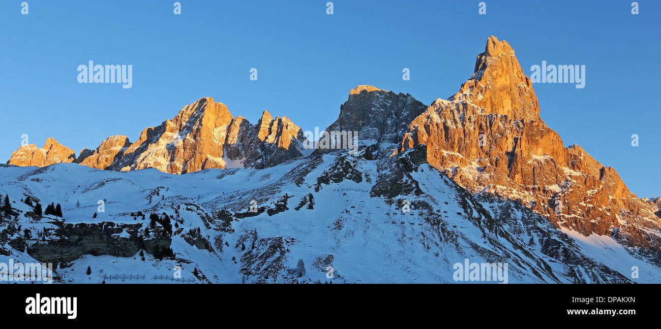 Sunset sunlight on the Pale di San Martino mountain group. Passo Rolle. Cimon della Pala, Vezzana peaks. The Dolomites of Trentino. Passo Rolle. Italy. Stock Photo