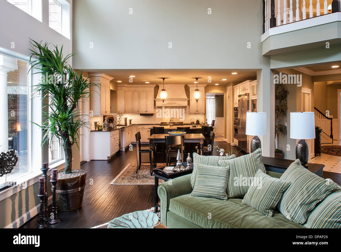 View from living room to kitchen in background in high-end luxury home  Stock Photo - Alamy