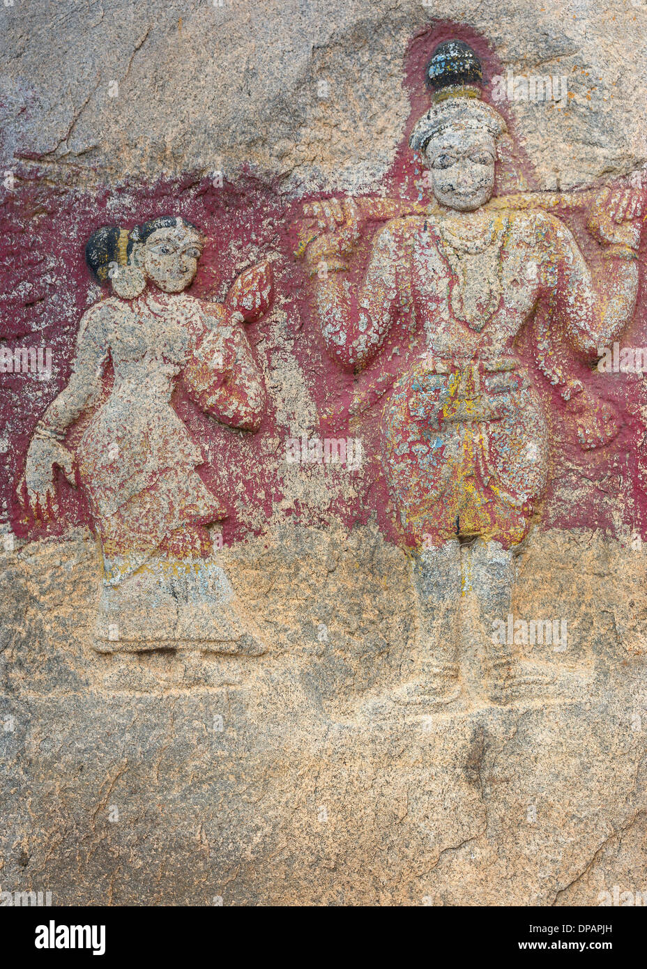 Millennium-old slab of rock with decoration at Sri Naheshwara in Bangalore. Worn off colors remain. Stock Photo