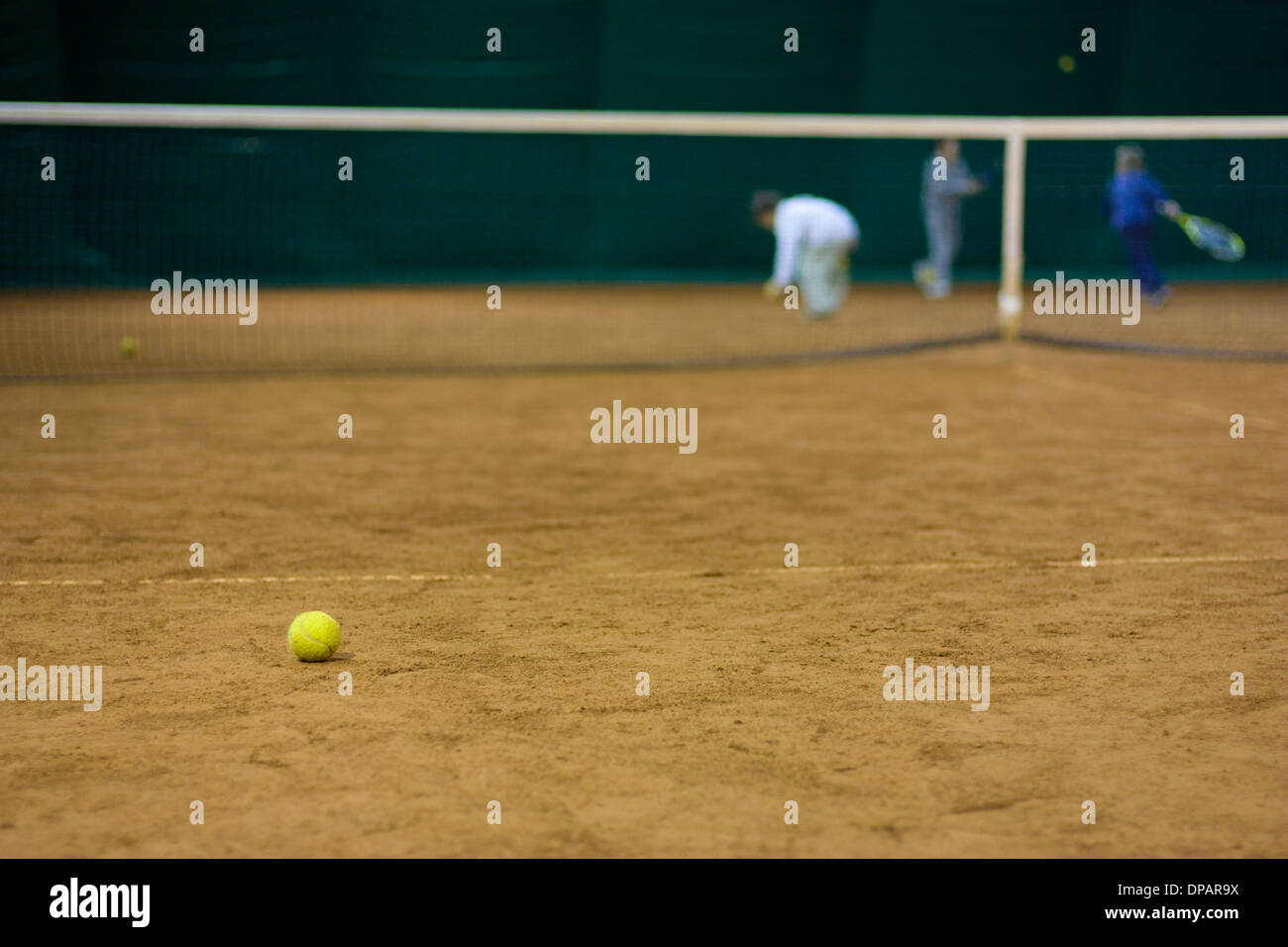 Tennis ball on clay court Stock Photo Alamy