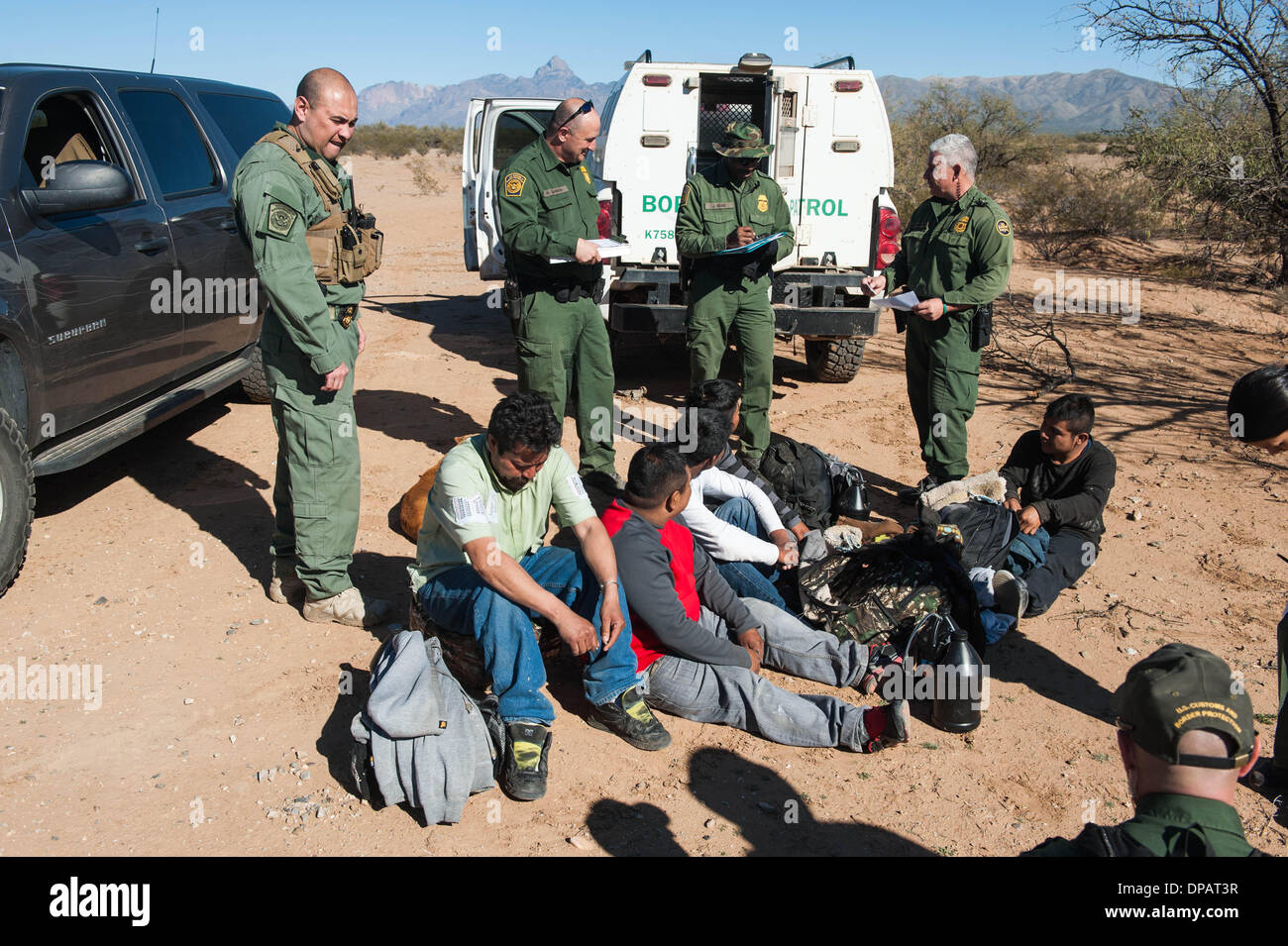 Sells, Arizona, USA. 10th Jan, 2014. U.S. Border Patrol agents stand