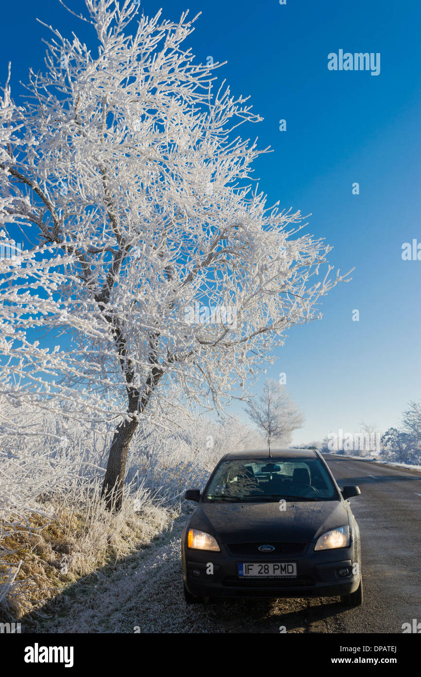 Car parked at the roadside on a winter morning Stock Photo - Alamy