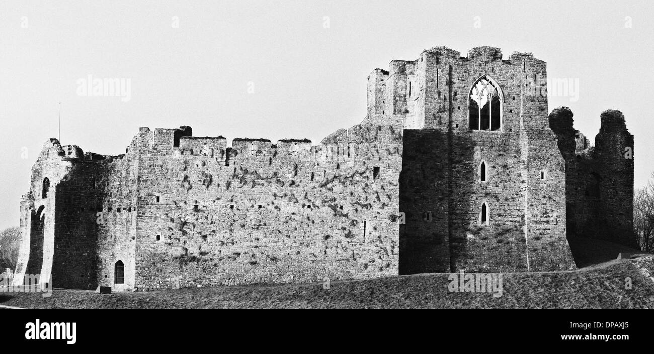 Oystermouth Castle, Mumbles, South Wales, rendered in black and white with grain for a retro look Stock Photo