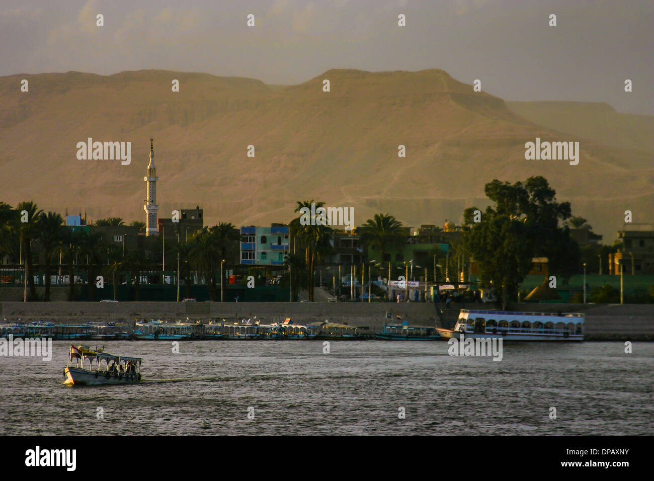Boat ferrying passengers across the Nile River in Luxor, Egypt Stock ...
