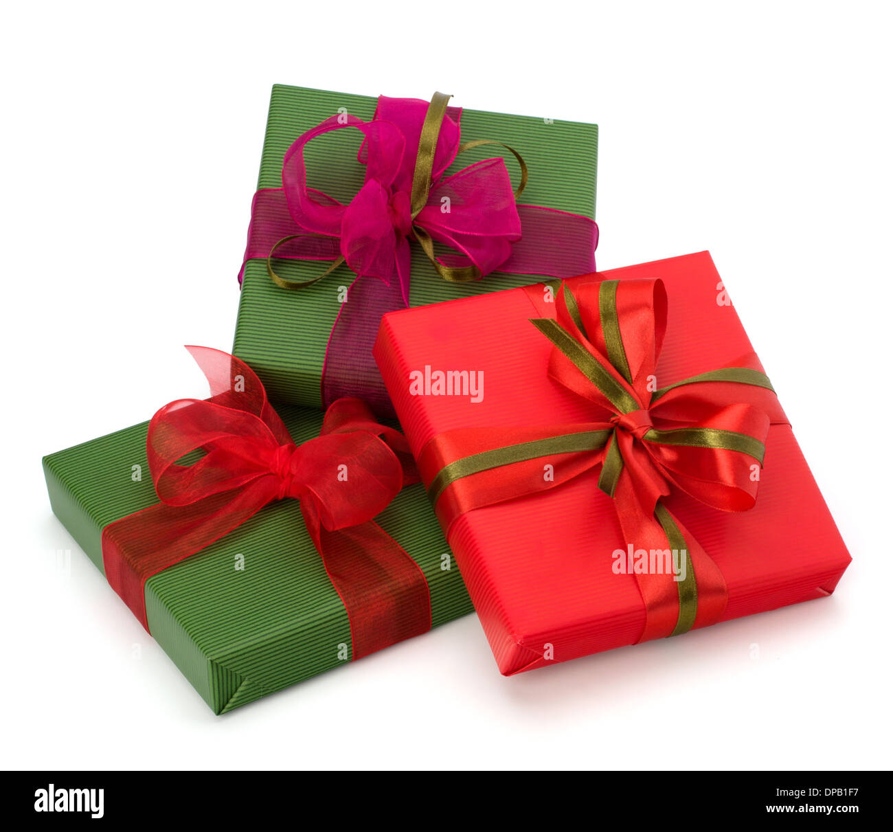 festive gift box stack isolated on white background Stock Photo - Alamy