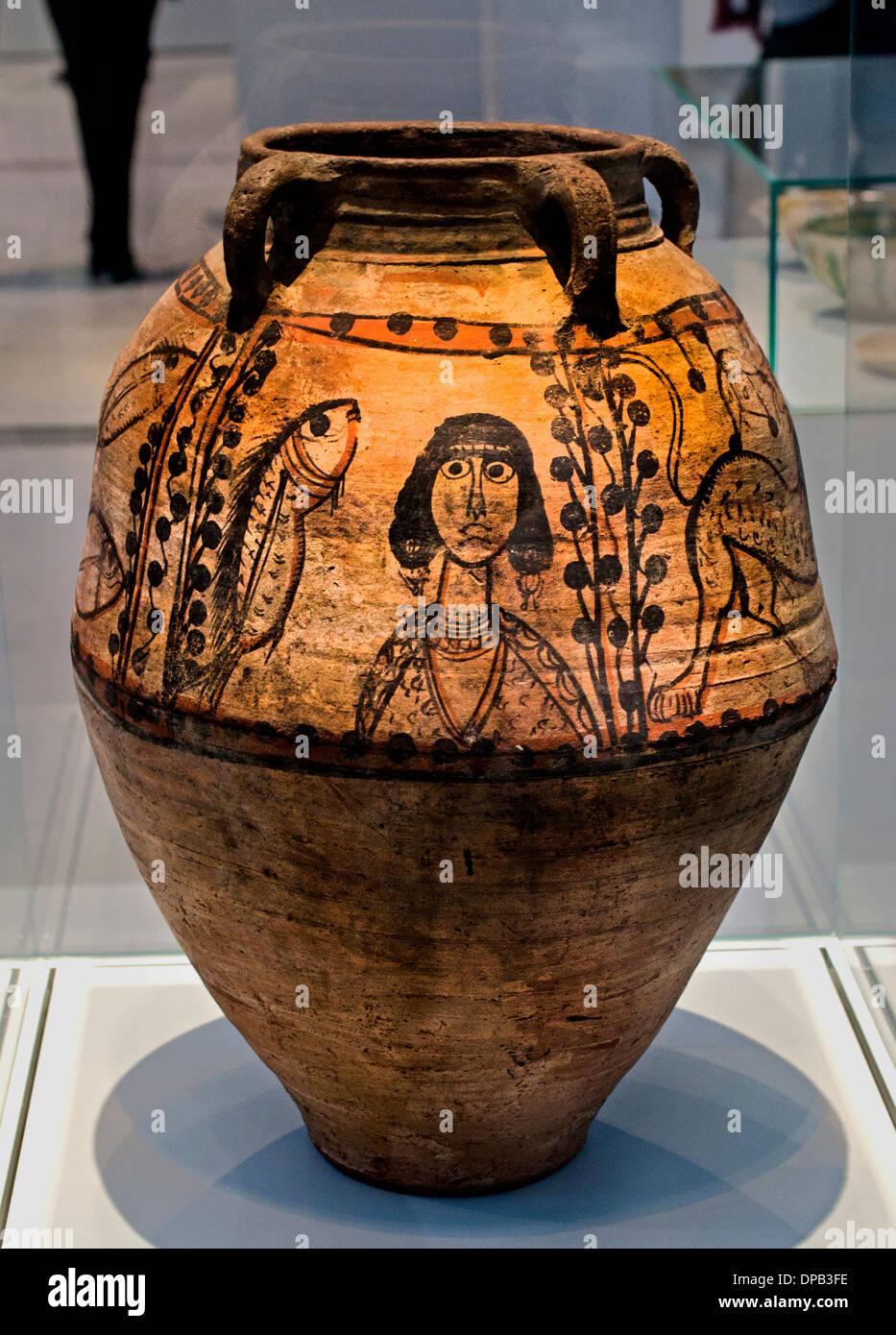 Jar decorated with a female figure and animals from  Ermant Egypt to 500-800 Egyptian Stock Photo