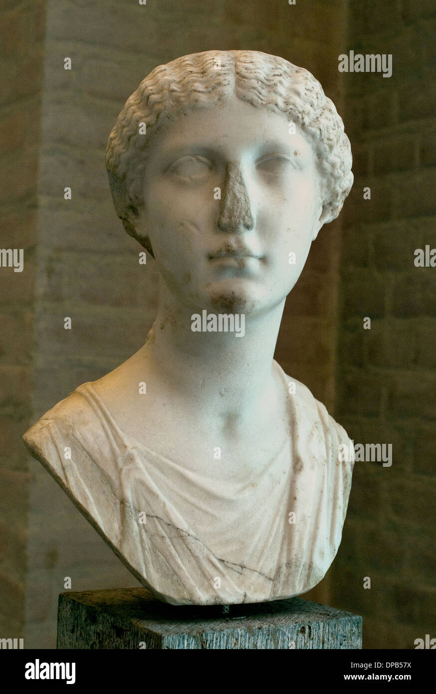 Bust of a young woman, ca. 30 CE. The garb she carries (stola) marks in this time a married woman. Roman Rome Stock Photo