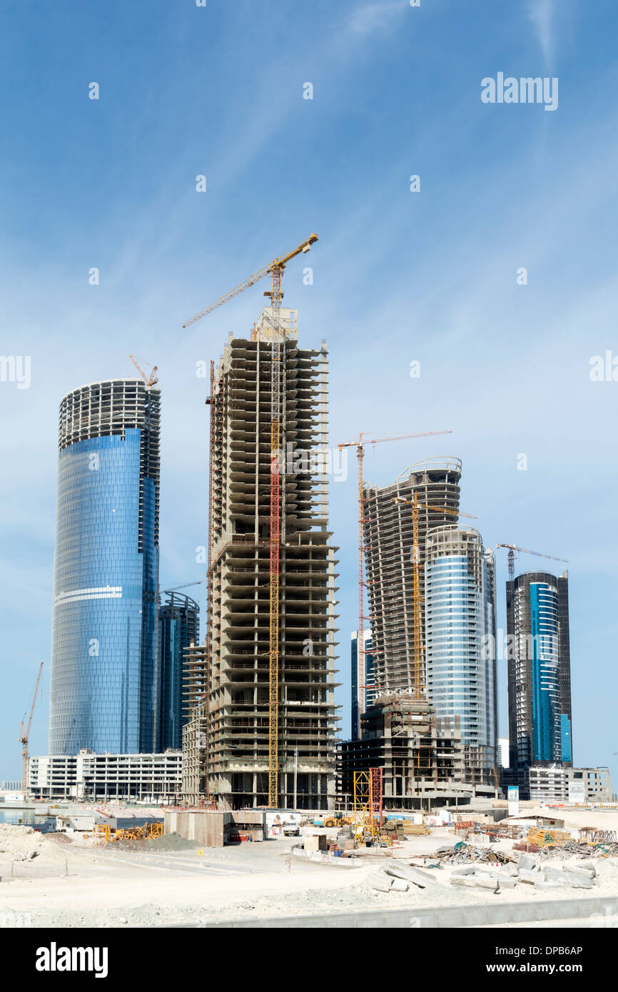 Many high-rise office and apartment towers under construction for new City of Lights at Al Reem Island new CBD in Abu Dhabi UAE Stock Photo