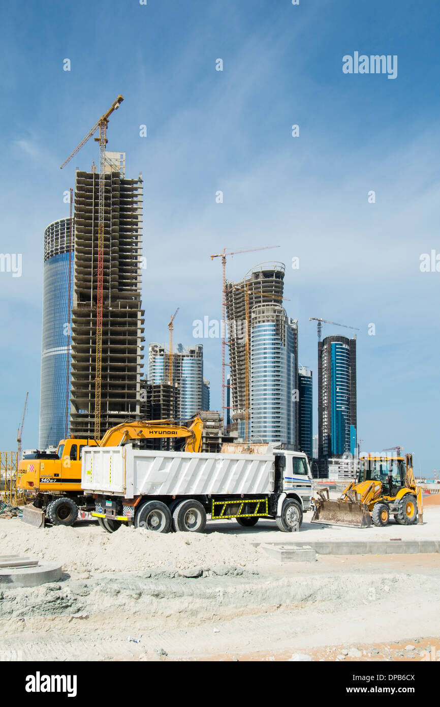 Many high-rise office and apartment towers under construction for new City of Lights at Al Reem Island new CBD in Abu Dhabi UAE Stock Photo