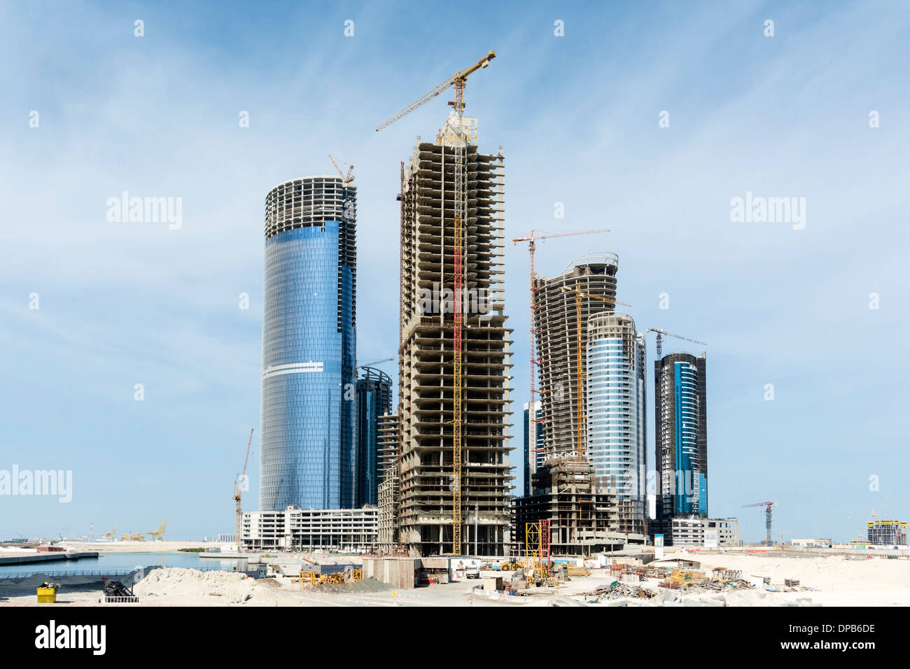 Many high-rise office and apartment towers under construction for new City of Lights at Al Reem Island new CBD in Abu Dhabi UAE Stock Photo