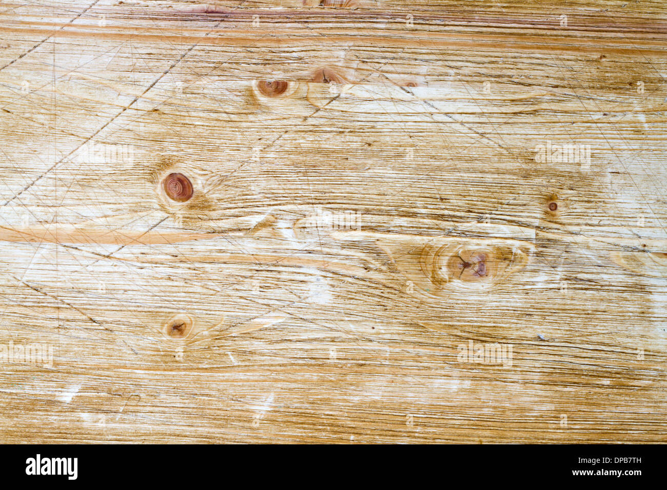 Old wooden cutting board background texture with scratches Stock Photo