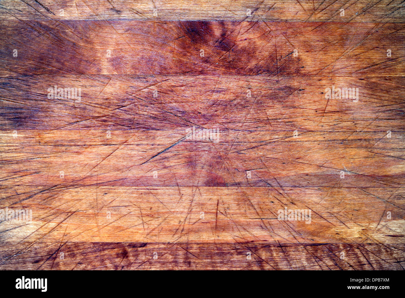 Old wooden cutting board background texture with scratches Stock Photo