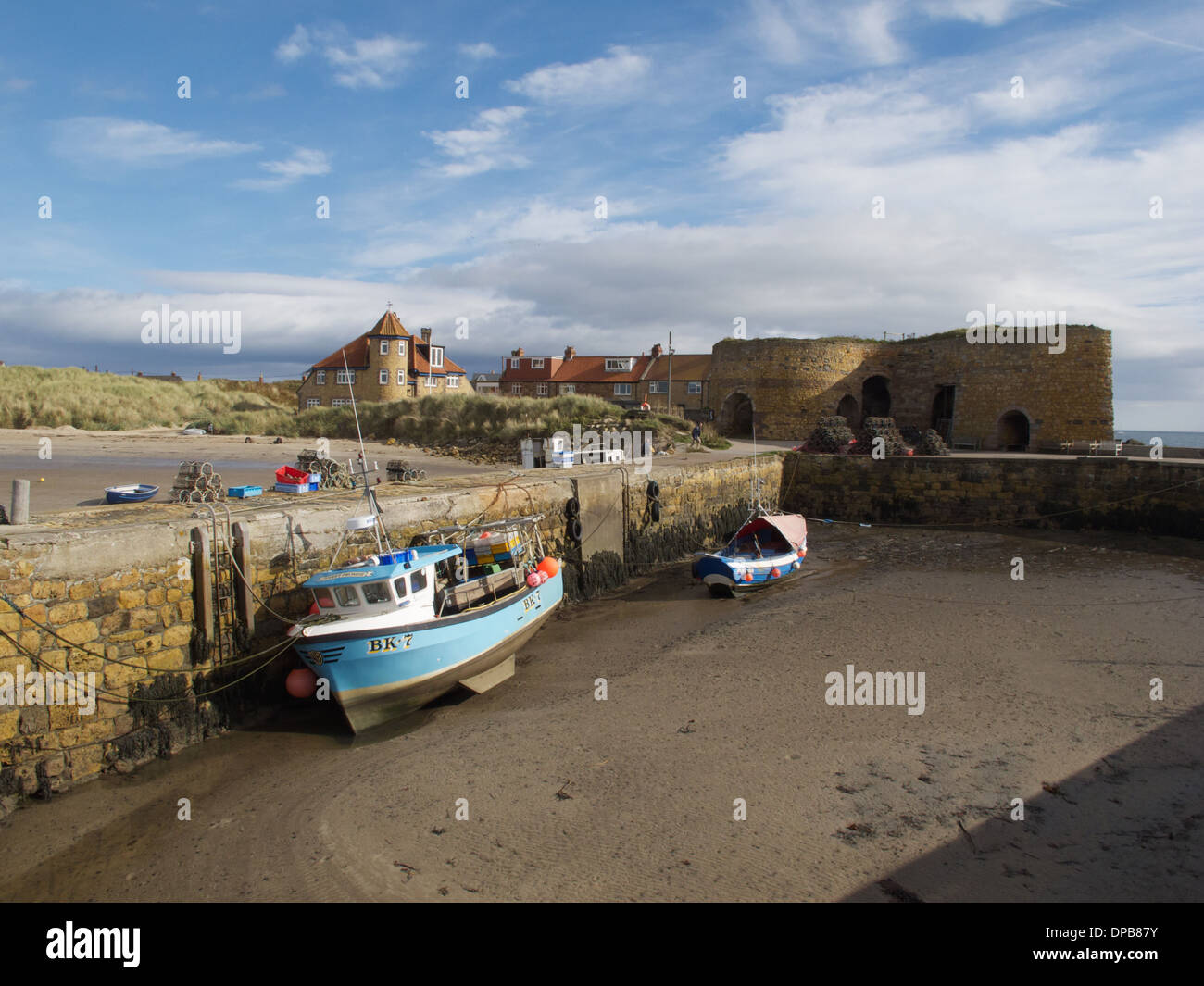 Fishing boats in Beadnell Bay harbour, Northumberland, England. Stock Photo