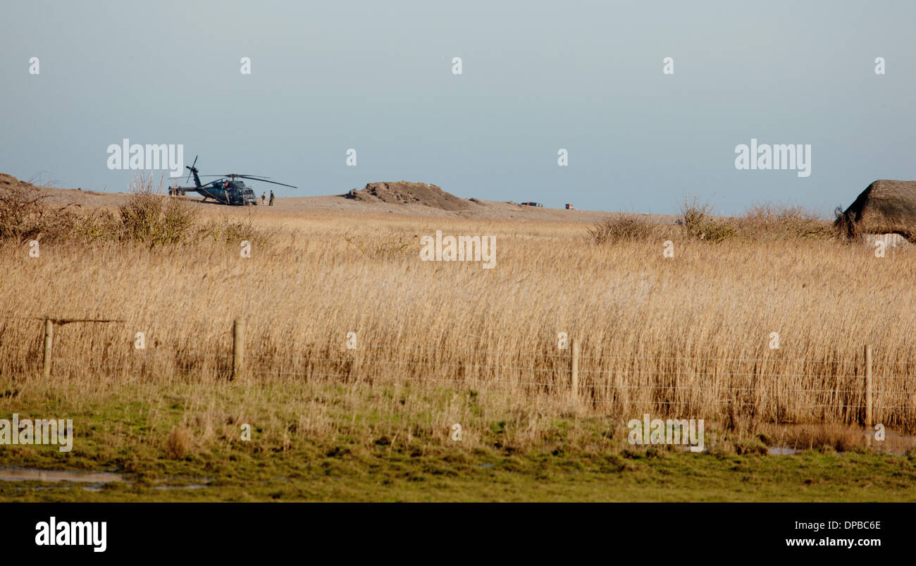 Cley, Norfolk, UK. 11th January 2014. USAF HH-60G Pave Hawk helicopter at  site on the North Norfolk coast at Cley where another crashed leaving four US airmen dead Credit:  Tim James/The Gray Gallery/Alamy Live News Stock Photo