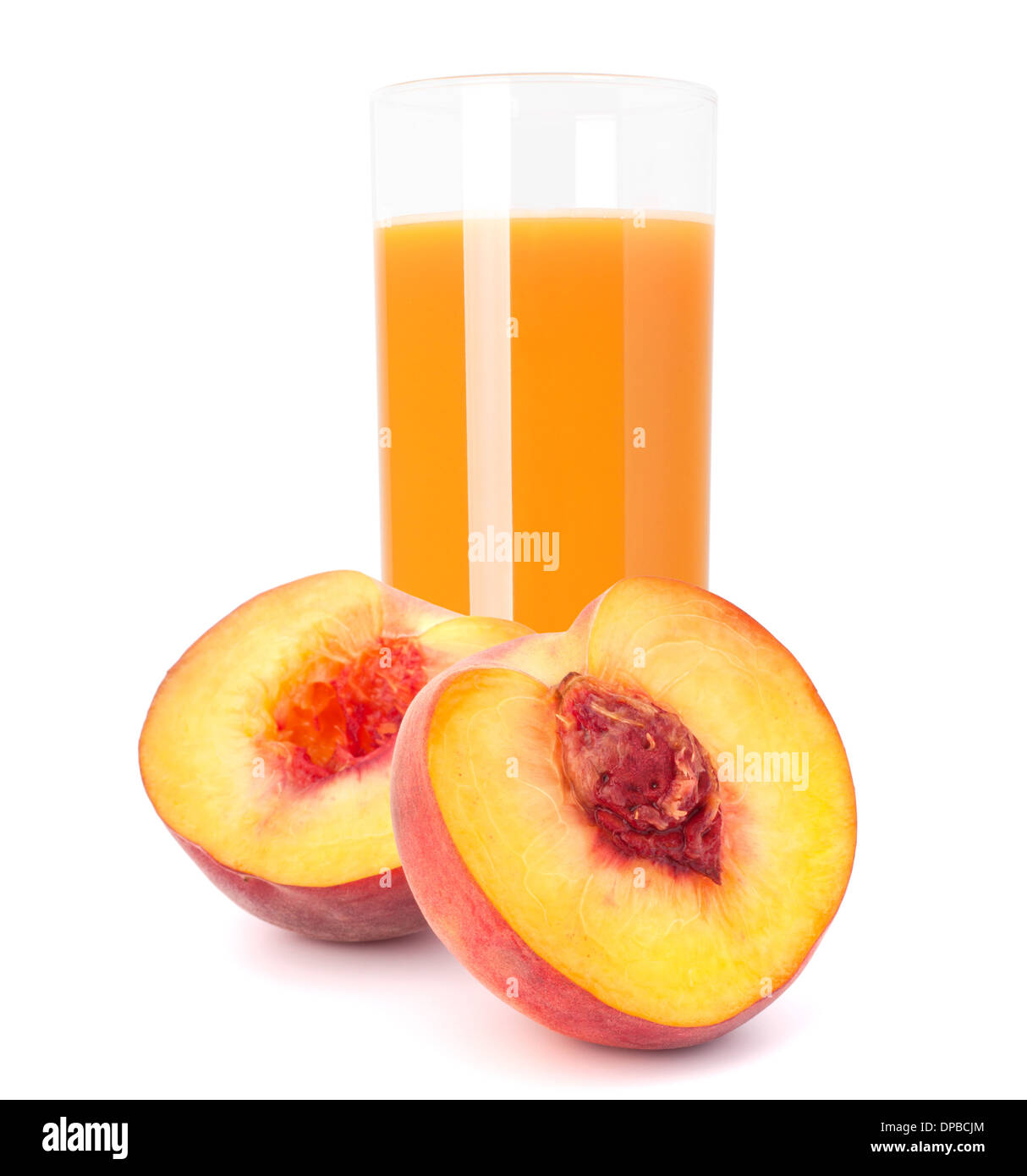 Peach fruit juice in glass isolated on white background cutout Stock