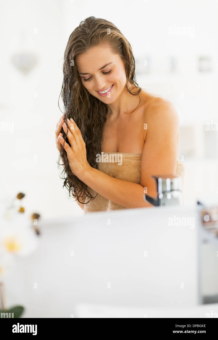 Applying hair mask hi-res stock photography and images - Alamy