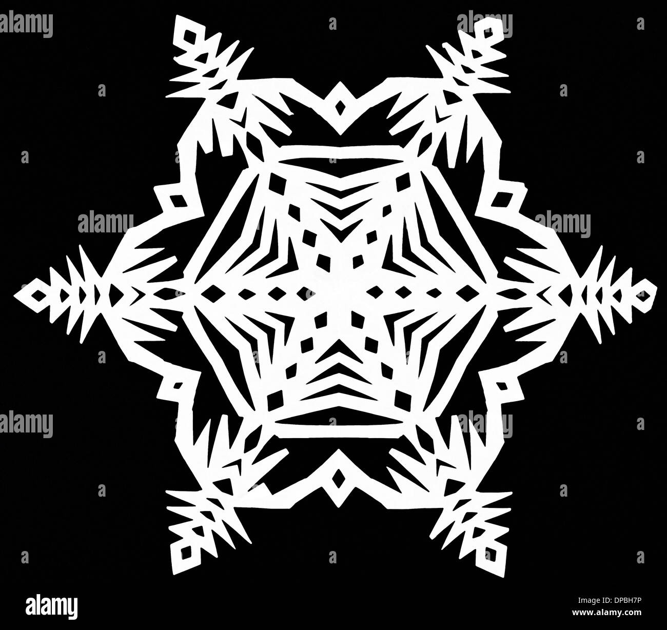 hand made cut out white snowflake on black paper background Stock Photo ...