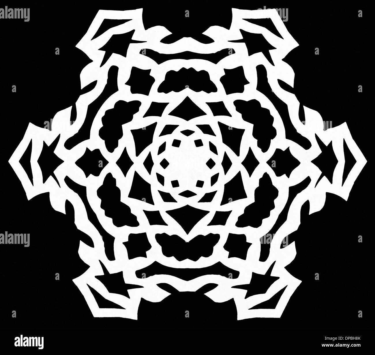 hand made cut out white snowflake on black paper background Stock Photo ...