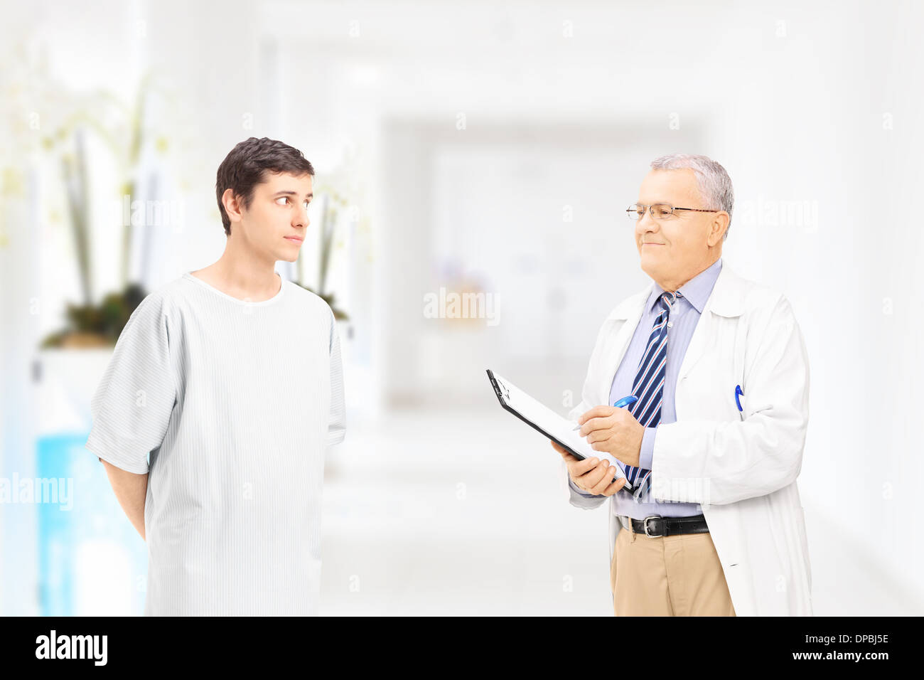 Doctor in hospital corridor hi-res stock photography and images - Alamy