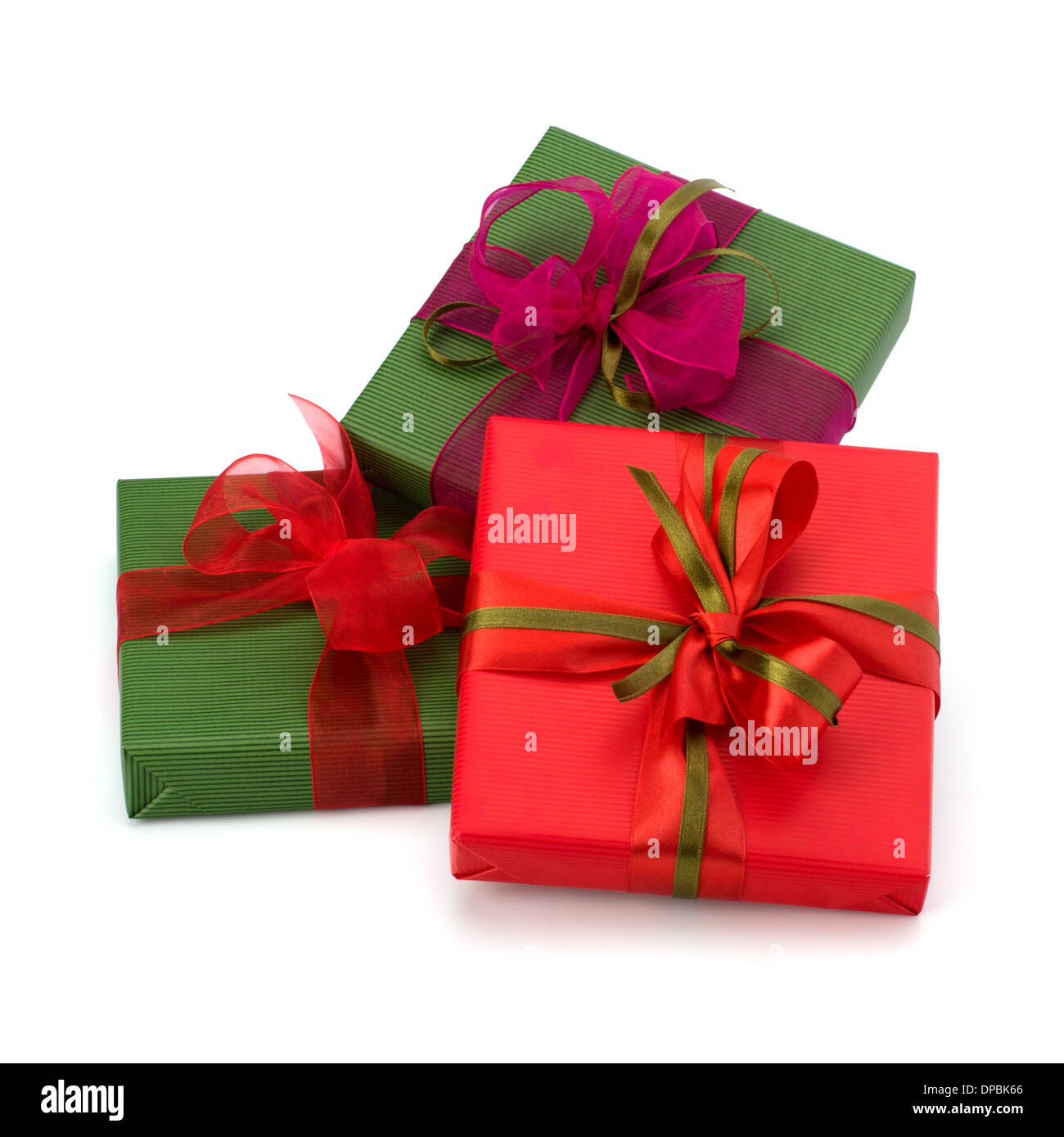 festive gift box stack isolated on white background Stock Photo - Alamy
