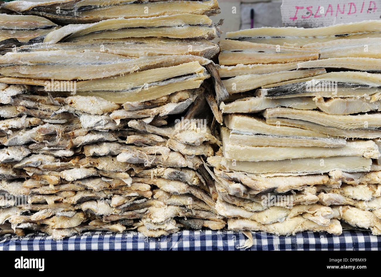 icelandic salted dried cod stacked in stand of the annual All Saints Market in Cocentaina, Alicante province, Spain Stock Photo