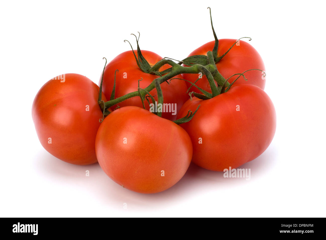 red tomato isolated on the white background Stock Photo - Alamy