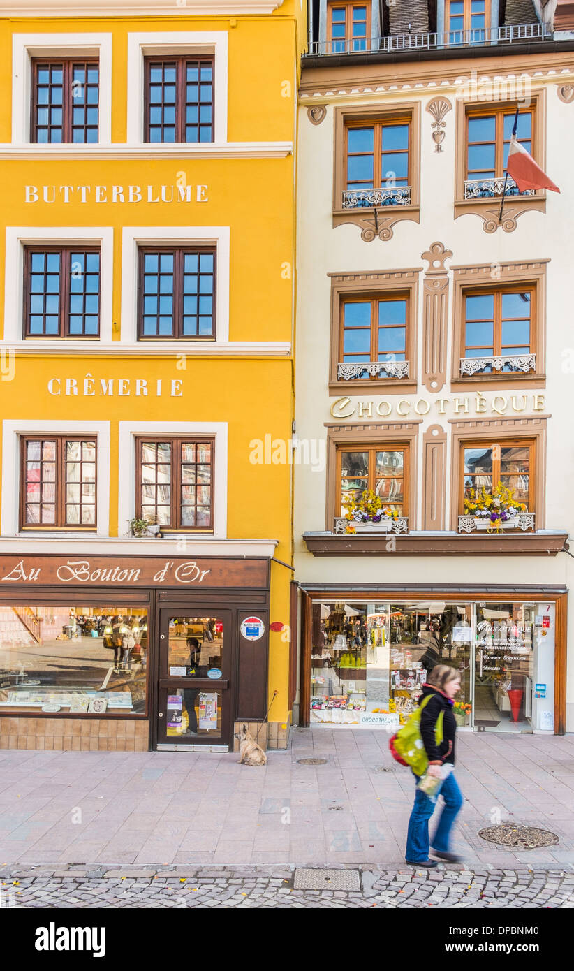 stores in historical buildings with renaissance facades, place de la reunion, mulhouse, alsace, france Stock Photo
