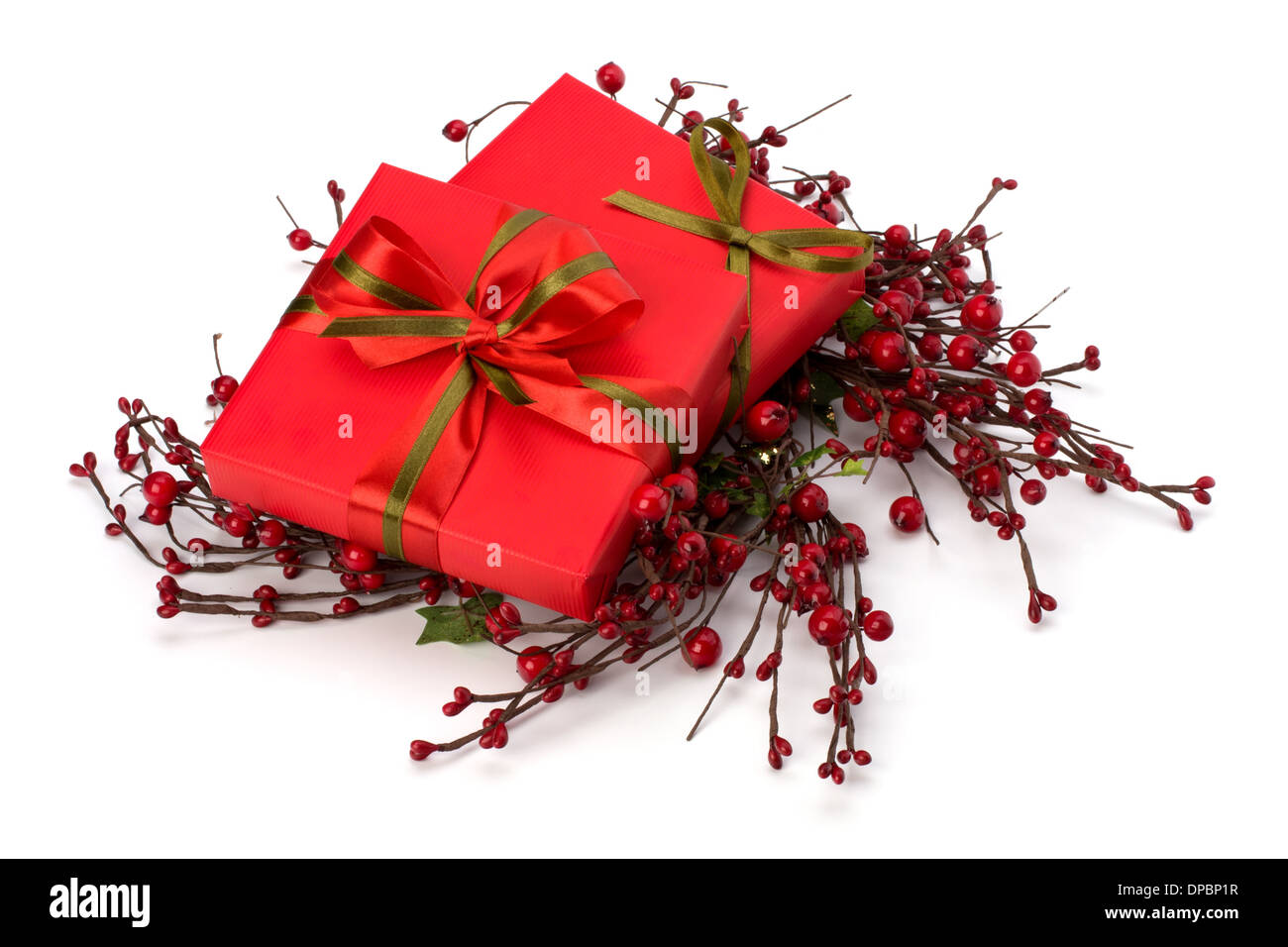 festive gift box stack isolated on white background Stock Photo - Alamy