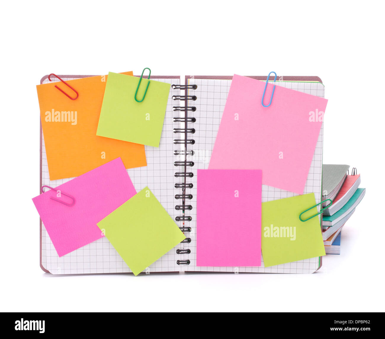 Blank checked notebook with notice papers isolated on white background cutout Stock Photo
