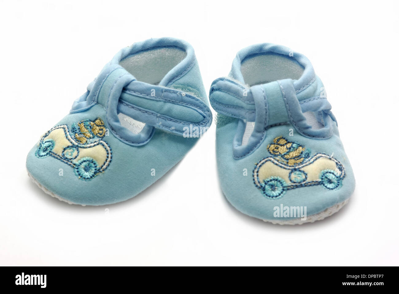 Newborn baby shoe isolated on white Stock Photo - Alamy