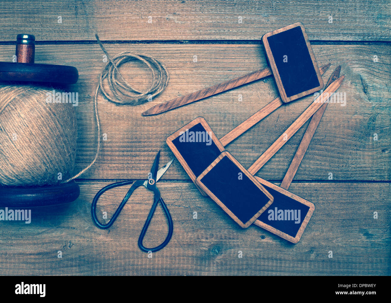 Garden string and scissors with blank herb tags Stock Photo Alamy