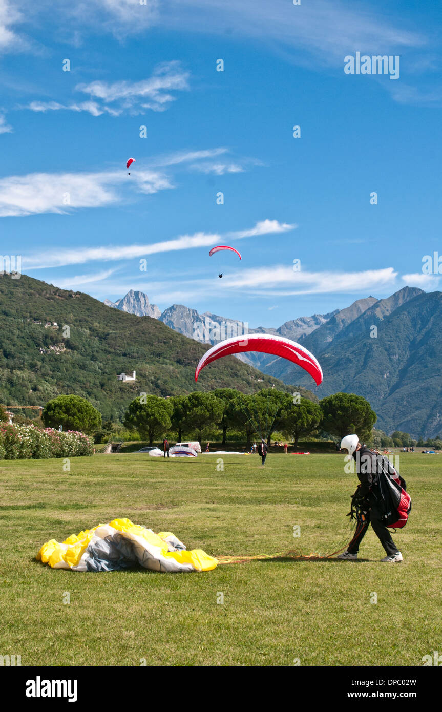 Paragliders landing in Sorico, Lake Como, Italy Stock Photo