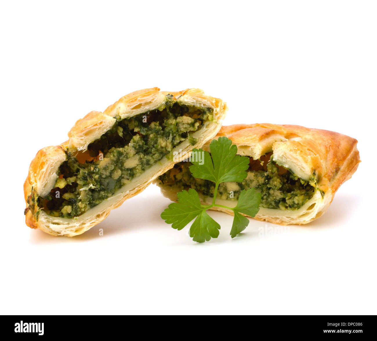 Puff pastry isolated on white background. Healthy pasty with spinach ...