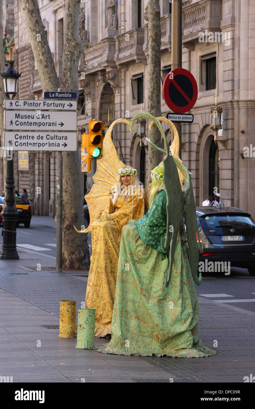 street performers in the central pedestrian's street of La Rambla, Barcelona Stock Photo